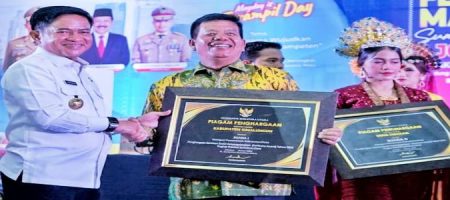 Bupati Simalungun Terima Penghargaan Paritrana Award Tahun 2024